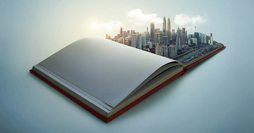 Graphic of an open book with a 3D city popping out of the page.