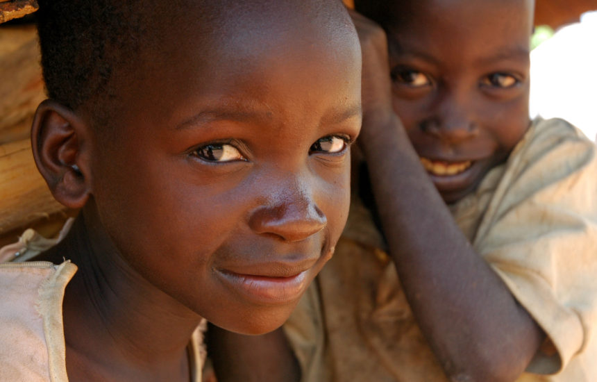 Close up photo of two young children.