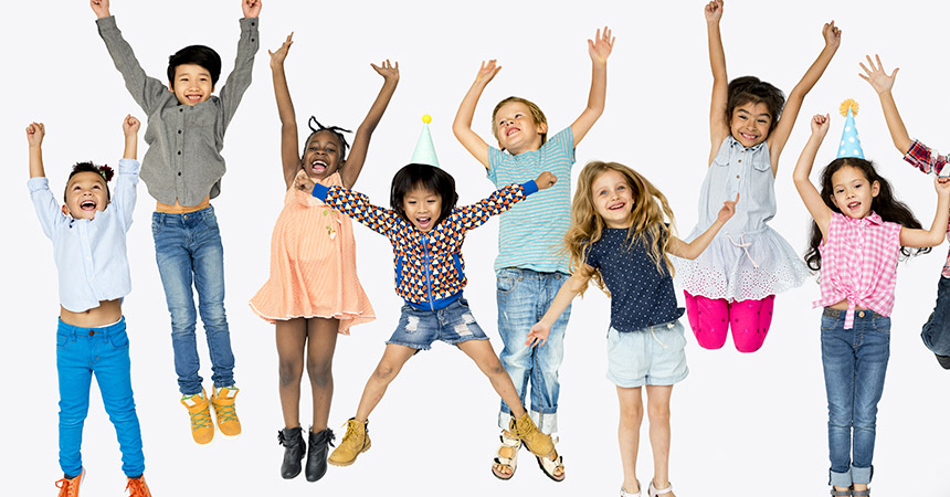 Children smiling and jumping