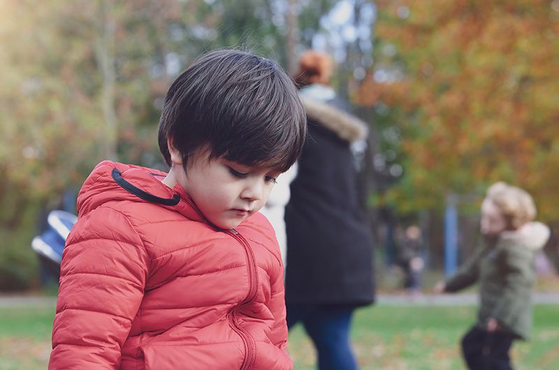 Sad child who could benefit from educator with trauma-informed practices.