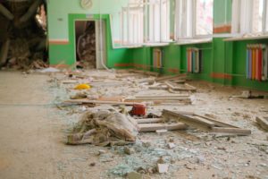 Windows blown out in a classroom in Ukraine.