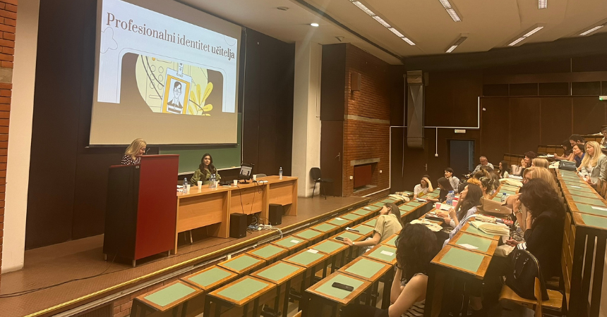 SECD conference- people in a lecture hall watching a presentation